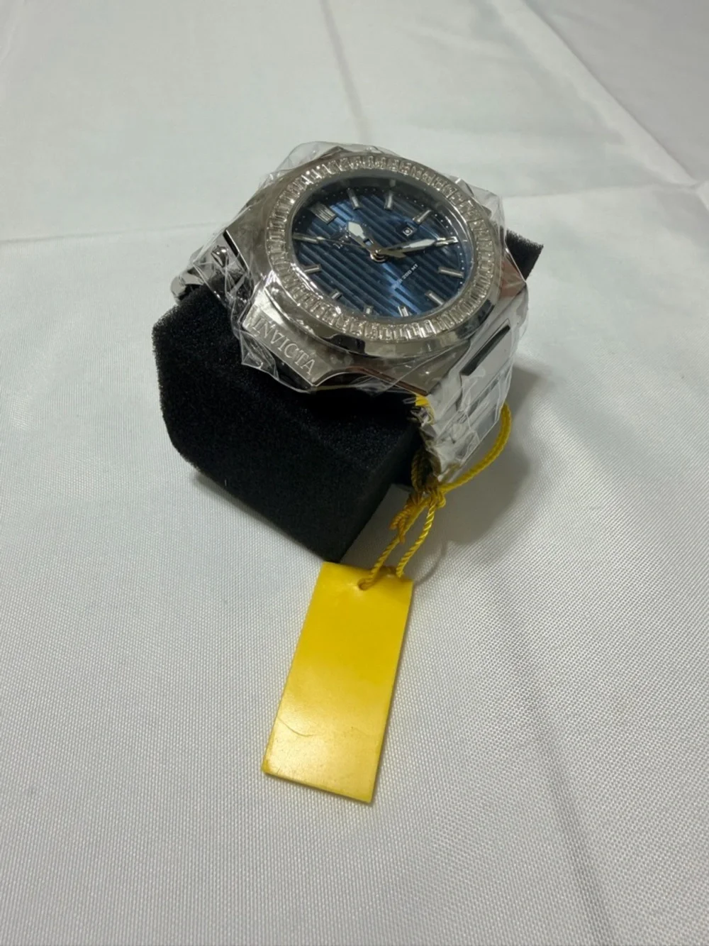 Invicta Men’s Akula 58mm silver watch with silver bracelet.